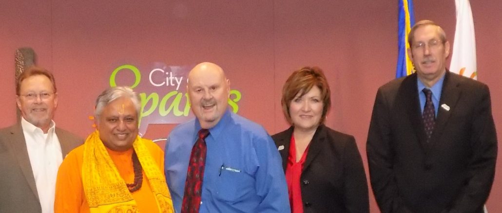 Just before the Hindu invocation, from left to right are—Councilmember Ed Lawson, Councilmember Ron Smith, Hindu statesman Rajan Zed, Mayor Geno R. Martini, Councilmember Charlene Bybee, Councilmember Ron Schmitt, and City Manager Steve Driscoll.
